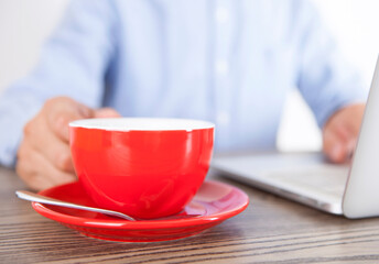 Men working over coffee
