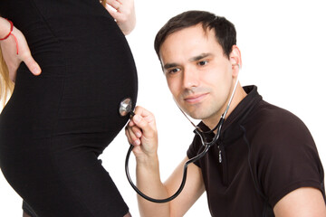 Photo of pregnant blonde and a man standing on a white isolated background