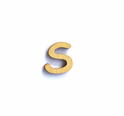 wooden letter s isolated on a white background, english alphabet from natural materials for children, eco friendly concept