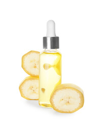 Bottle of banana essential oil on white background