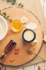 Composition with banana cosmetics on table