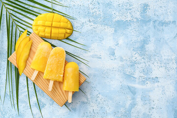 Composition with mango ice cream on color background