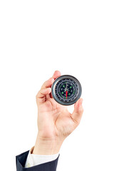 Hand view of a businessman with a compass. Travel concept