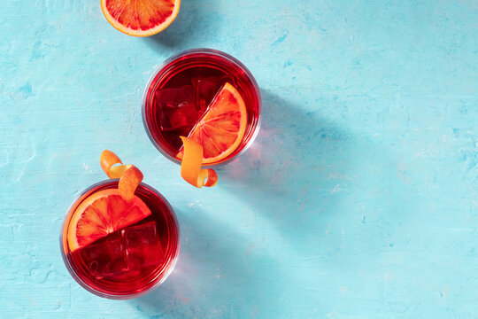 Negroni cocktails decorated with blood oranges, top shot