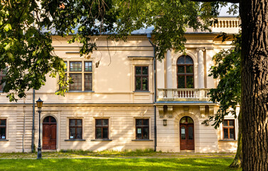 Fototapeta na wymiar New Zywiec Castle, south-eastern wing of Habsburgs Palace within historic park in Zywiec old town city center in Silesia region of Poland