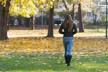 Attractive Woman Walking In Autumn Forest