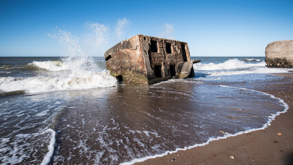 Ruins of old war fort in Liepaja, sea, waves and splashes. Liepaja, Latvia