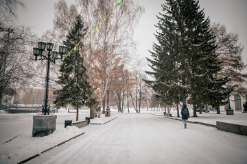 Snowy city with poor visibility, snowstorm on the street.