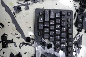 Broken keyboard. Destroyed keyboard. An image of computer frustration.