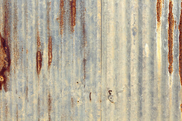 Old zinc vintage fence wall texture for background, pattern of rusty on metal panel.
