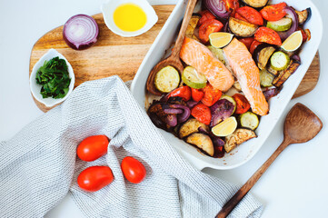 oven roasted vegetable mix  - tomato, red onion, zucchini and eggplant with baked salmon. Healthy...