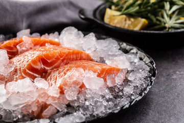 Fresh salmon fillets chilled in ice