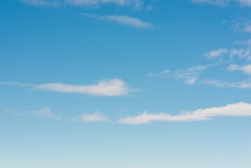 Fototapeta premium White clouds in blue sky.Winter clouds blue heaven background.