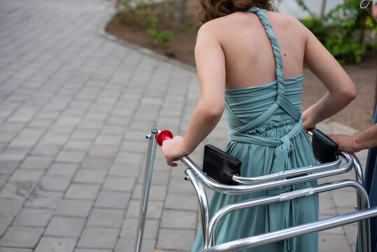 Young Woman With A Stroller Shot From Behind