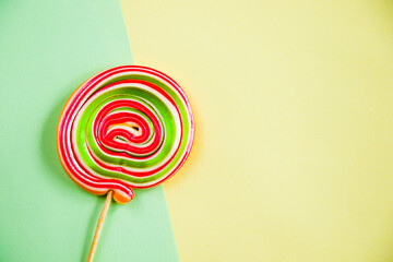 Colorful candies, lollypop on the colorful background