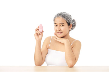 Woman with using silicone cleansing facial brush