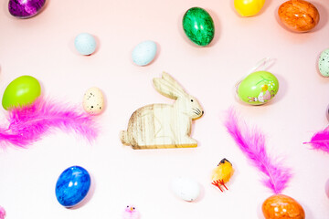 Fototapeta na wymiar Easter eggs, Easter bunny, chicks on a pastel background