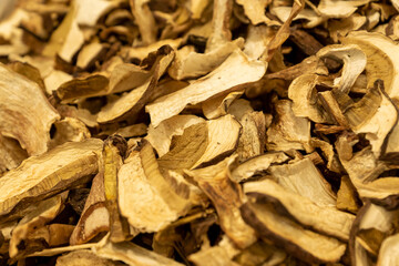 Dried edible mushrooms boletus. Raw vegan food background.