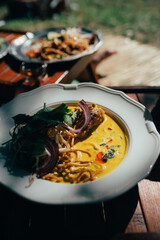 Delicious soup and other food on the table