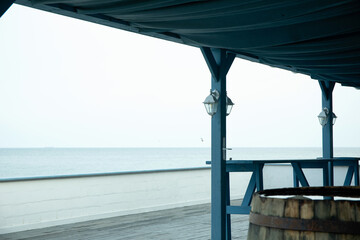 Fototapeta na wymiar Restaurant with a wood counter on the seaside