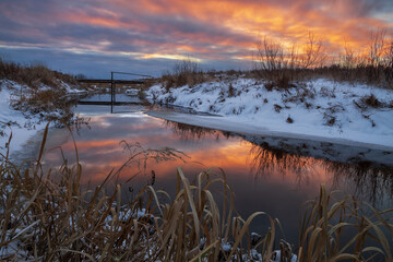 wooden bridge over the stream