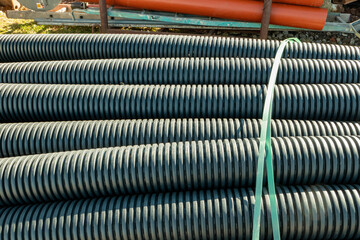 Plastic pipes with grooves on the construction site