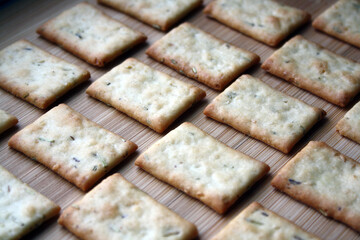 Crackers with rosemary and dill. Culinary background.