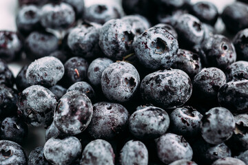 blueberries, frozen blueberries, berries covered with hoarfrost. Background. blueberries background. Macro blueberries