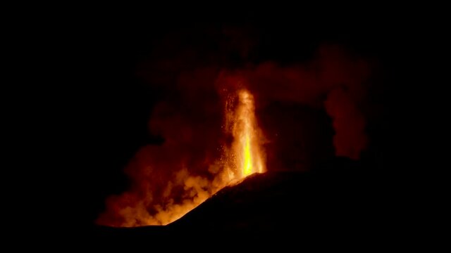 Paroxysmal activity of the Sicilian volcano Etna during the day of 24 February 2021. Explosions, lava and column of smoke that covered the neighboring Etna villages with ash and lapilli.