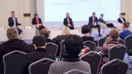 Audience listens to the lecturer