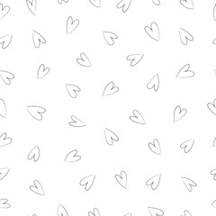 Abstract seamless pattern with black hearts on a white background. Pencil drawn style. Universal print
