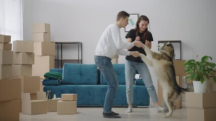 Long shot. The young family is happy to move to a new home.