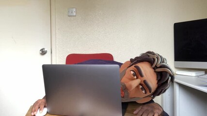 Claymation animated overworked man sleeping on laptop