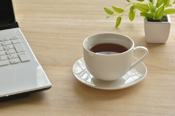 A cup of coffee on a desk