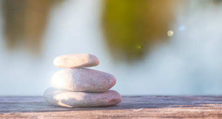 three stones, relaxation summer sunny day, three symbols water air earth