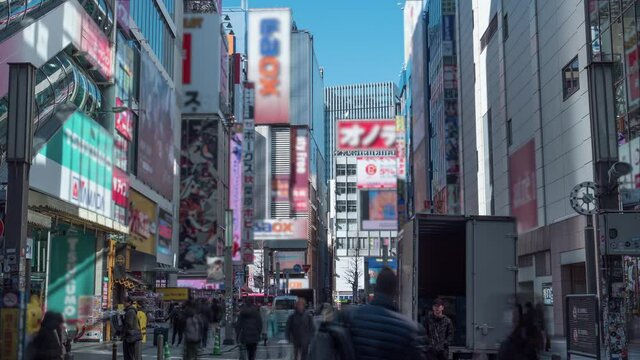 Akihabara electric town, the most famous place in the word for electronics, manga, anime. 4K time-lapse. Blurred logos