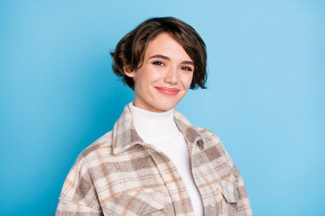Photo of optimistic cute short hairdo lady wear white shirt isolated on vivid teal color background