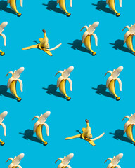 Pattern of yellow bananas on a blue background