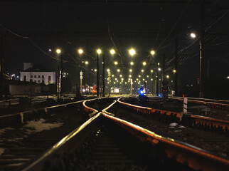 Fototapeta na wymiar a railway station at night
