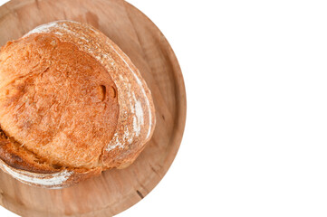 Round homemade bread on a wooden plank, on an isolated background