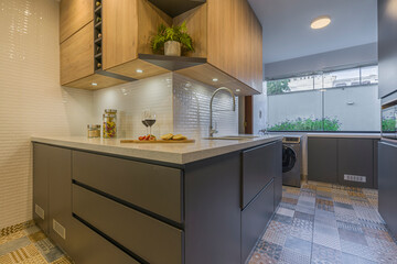 American model kitchen remodeled with good lighting, spacious cabinets and drawers.