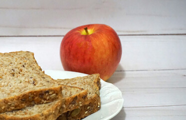 Sprouted Whole Grains Sliced Bread close up. Healthy eating concept.