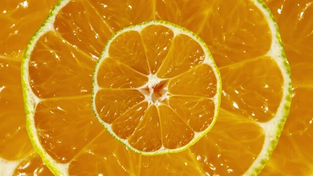 Zooming natural mandarins in psychedelic motion graphics seamless looped animation