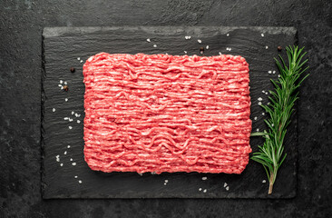 fresh minced meat on stone background