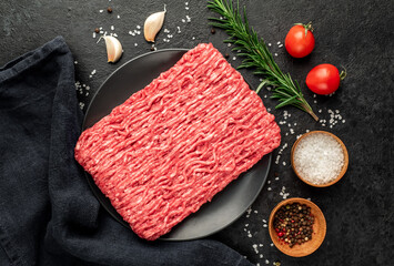 fresh minced meat on stone background
