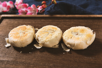 Chinese Mid-Autumn Festival Su shi moon cake on wood background