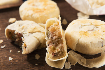 Chinese Mid-Autumn Festival Su shi moon cake on wood background