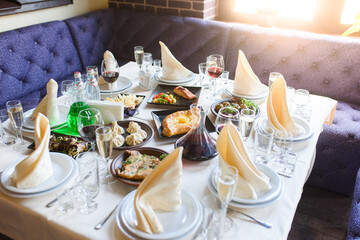 Assortment different Georgian dishes for the company. Table setting