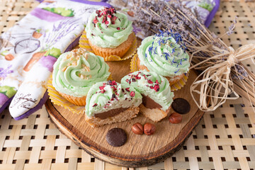 Obraz na płótnie Canvas Cupcakes with chocolate nuts and lavander