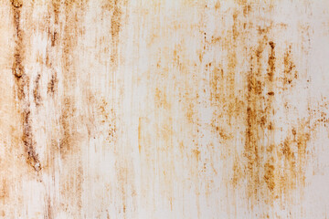Dirty wall with smeared rust marks